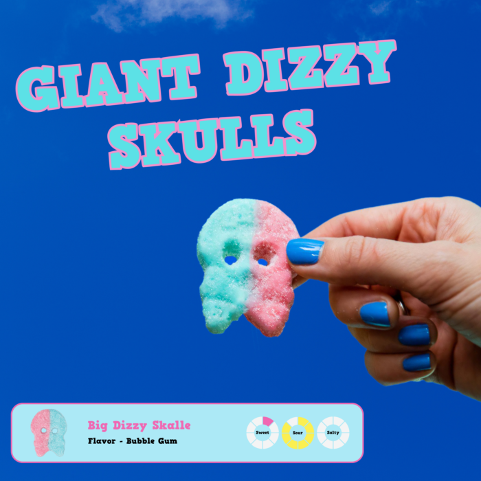 a hand holding a Bubs dizzy skulls candy skull