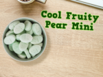 a bowl of Bubs fruity pear mini candies on a table